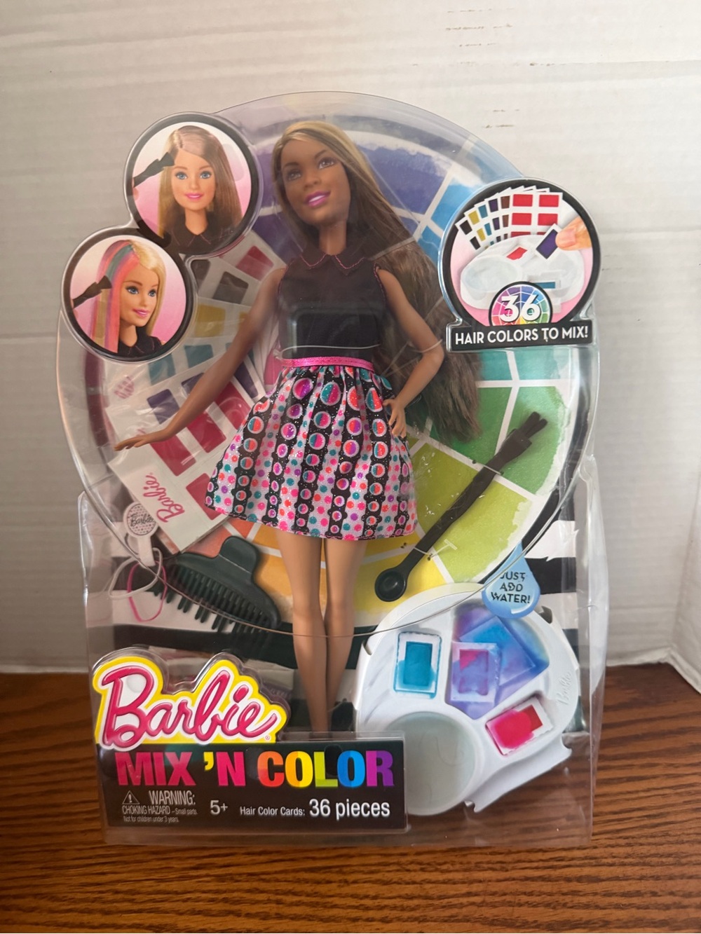 Barbie Doll with Black Top and Pink Patterned Skirt
